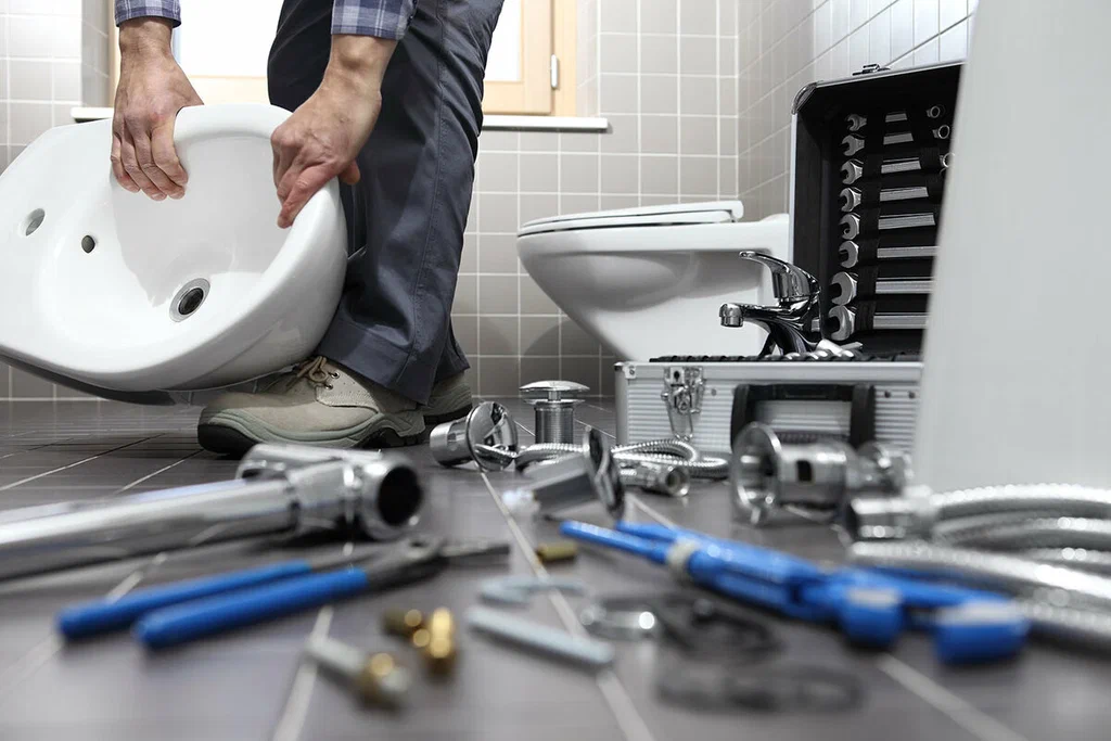 Plumbing tools prepared for a bathroom repair in Holiday